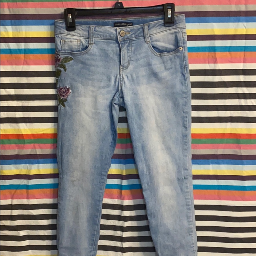 Light wash jeans with embroidered roses